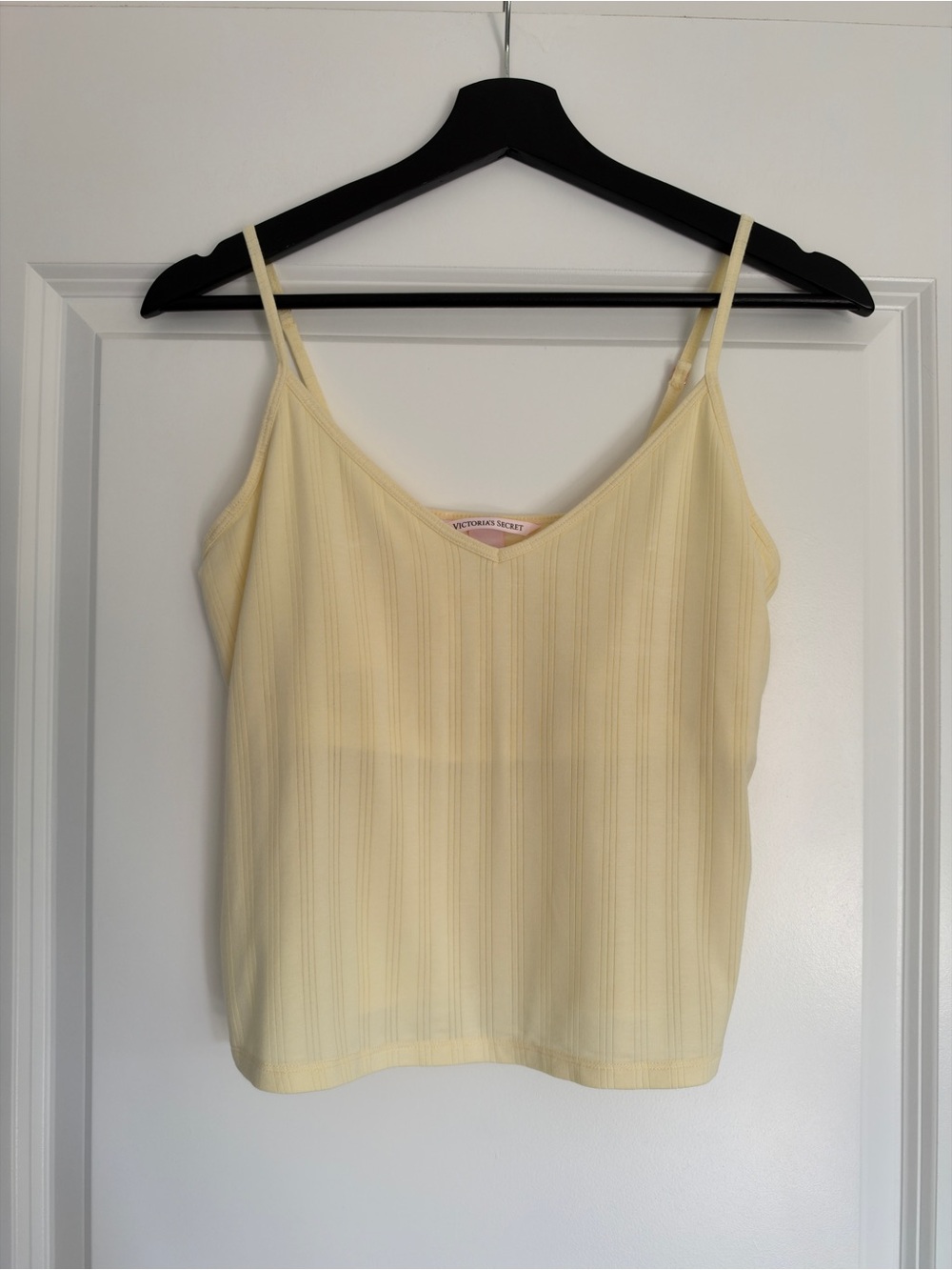 Victoria’s Secret ribbed cami in a soft yellow. Size M